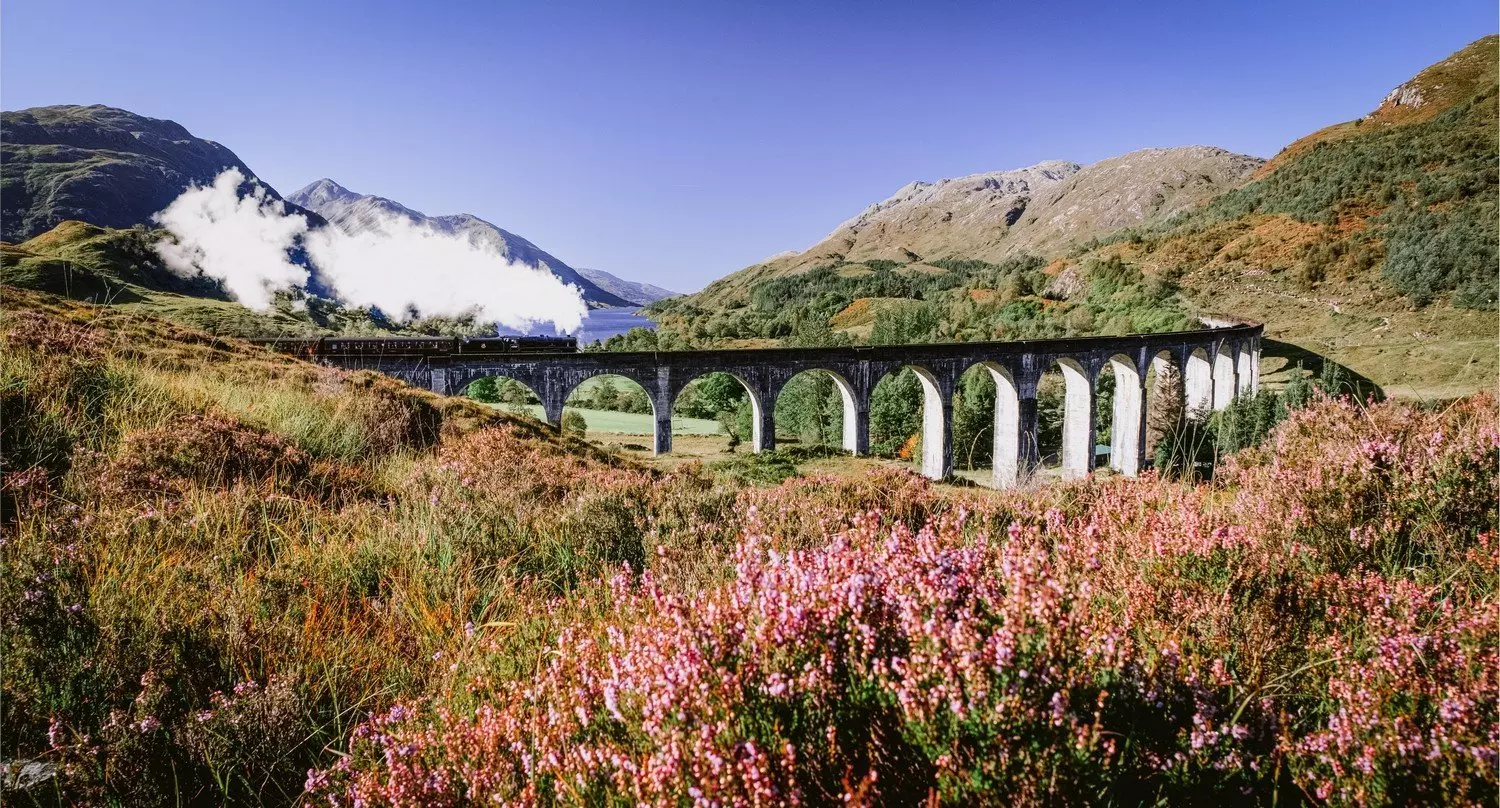 Jacobite on Glenfinnan Viaduct - © A.Blanke/shutterstock Steam train